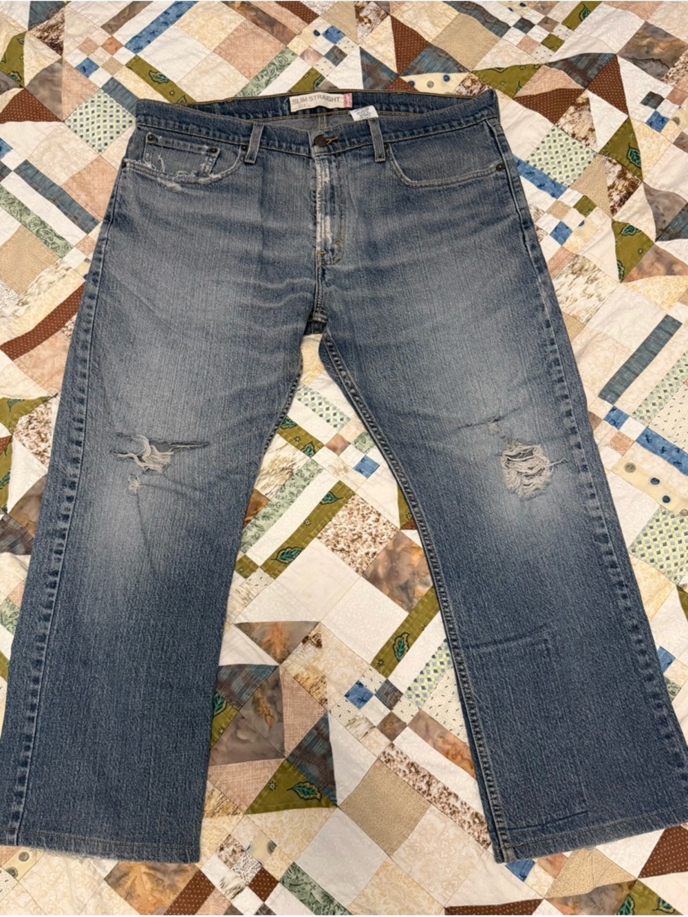 Levi's Men's Straight Jeans in Faded Blue with Knee Distressing